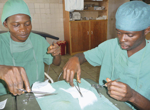Two participants at the start of their two-year programme of continuing education under the auspices of CapaCare’s surgical…