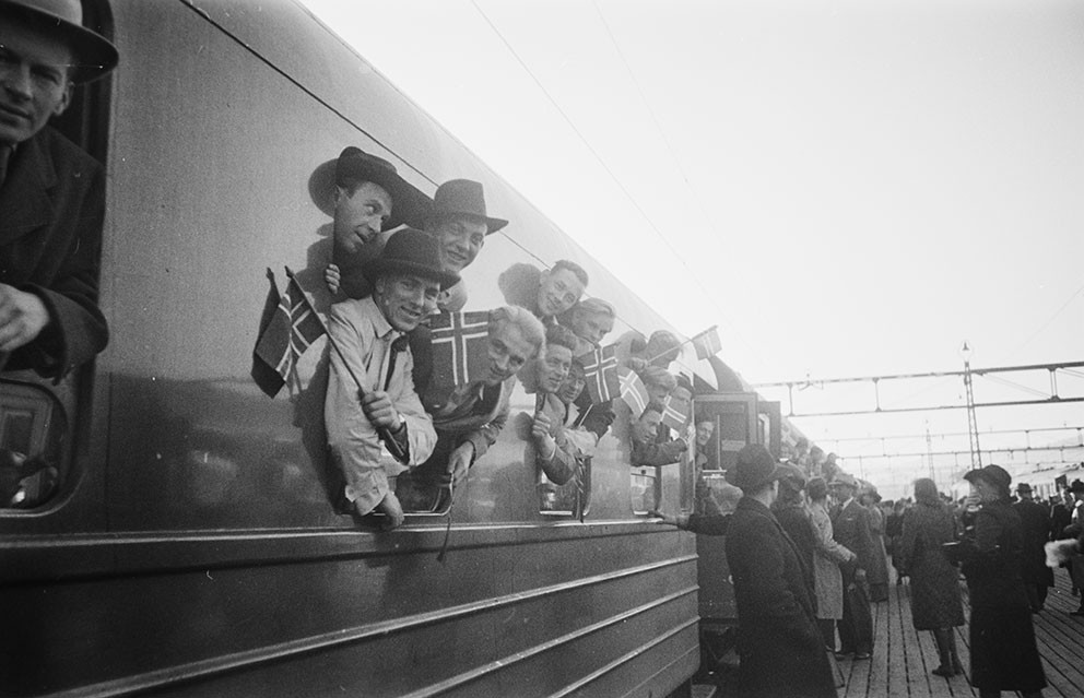 Students returning home from captivity in Buchenwald, Oslo East Railway Station (Østbanestasjonen) 1945. Photo: Rigmor Dahl…